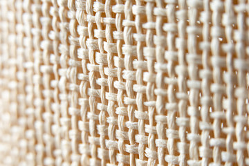 weaving the straw surface of the rug. texture. close-up macro