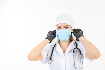 Fototapeta na wymiar Wearing protective mask. Female doctor or nurse in latex or rubber gloves. Health care concept