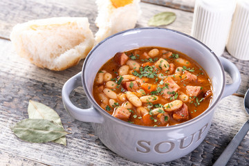 Baked beans in tomato sauce with chopped sausage