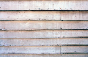 texture of old white painted wood used as natural background in Bergen city