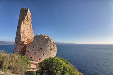 Naklejka premium The Poetto Tower on the Sella del Diavolo in Cagliari, Sardinia, Italy