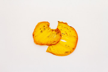 Fototapeta na wymiar Dried slices of persimmon isolated on white background