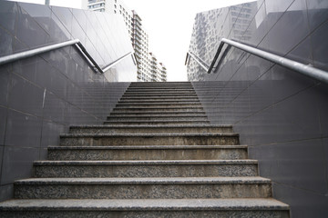 modern grey stone staircase in the city with nobody