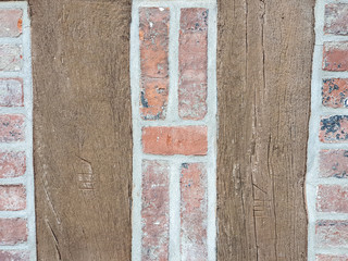 Background texture half timbered house and a brick red wall