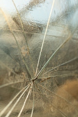 Texture of glass, crack, dust and scratches, close-up