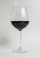 glass of red wine isolated on white background