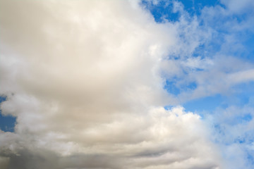 Fototapeta premium Blue summer sky with white cumulus clouds. Blue sky with clouds nature background.