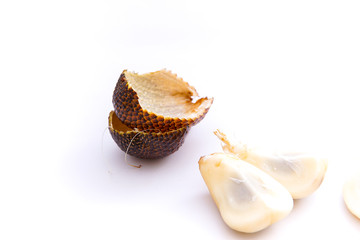 peeled salacca or thorny palm, isolated white background and copy space, scientific name: Salacca zalacca