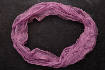 Cheeseclot, purple antique gauze. Purple organza macro fabric texture. Circle . Copy, text space.