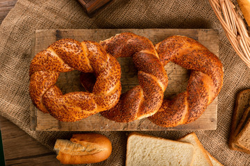 Tasty turkish bagels on kitchen board