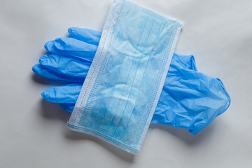 protective mask and rubber gloves. Suitable for demonstrating personal protective equipment during the period of viruses