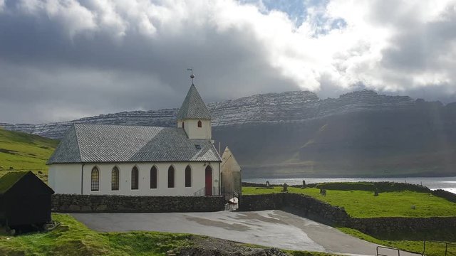 Vidareidi village with village's church, Vidoy island, Faroe Islands, Denmark.