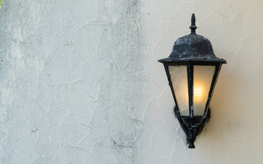 black lamp on the wall © Dan