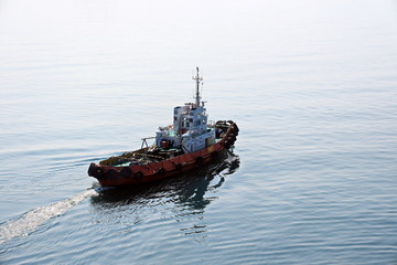 Bunkering of a ship on the open roadstead of the port of Nakhodka, Russia.