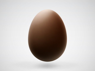Single realistic chocolate Easter 3D egg with shadow on white background. Vector illustration of brown sweet chocolate chicken egg - traditional symbol of Easter holiday celebration.