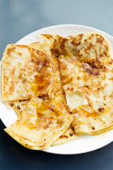 Sweet msemen - Moroccan pancakes with honey 