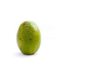 fresh green amberella fruit, isolated on a white background and copyspacefresh green amberella fruit, isolated on a white background and copyspace, scientific name: Spondias dulcis