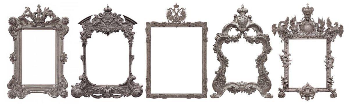 Set of golden frames with crown for paintings, mirrors or photo isolated on white background