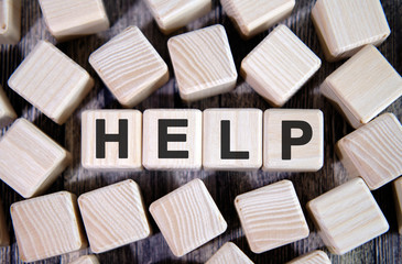 Help - text on wooden cubes. And many cubes around