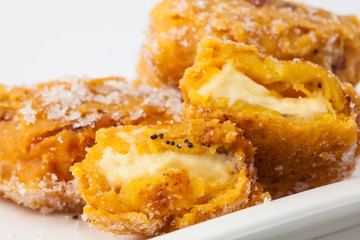 Typical Colombian aborrajados served on a white dish