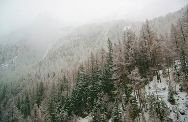 Snow covered Zermatt and fog in Switzerland in winter