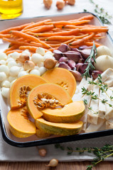 Raw Pumpkin, Baby Carrot, Onion, Garlic and Celeriac Ready for Cooking