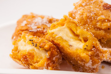 Typical Colombian aborrajados served on a white dish