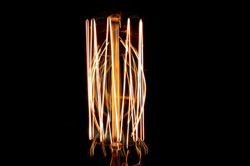 glowing vintage edison light bulb