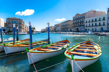 Sète in France, typical boats on the quay, in the center
