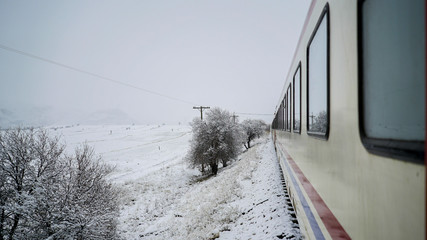 Obraz premium Eastern Express train - Snow covered rails