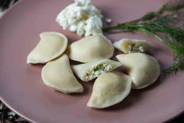 dumplings with cheese, homemade traditional Ukrainian dish varenyky