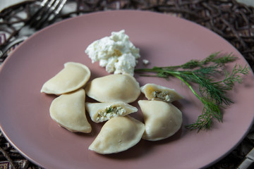 dumplings with cheese, homemade traditional Ukrainian dish varenyky