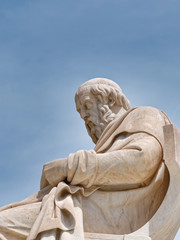 Obraz premium Plato the ancient philosopher marble statue under blue sky background, Athens Greece