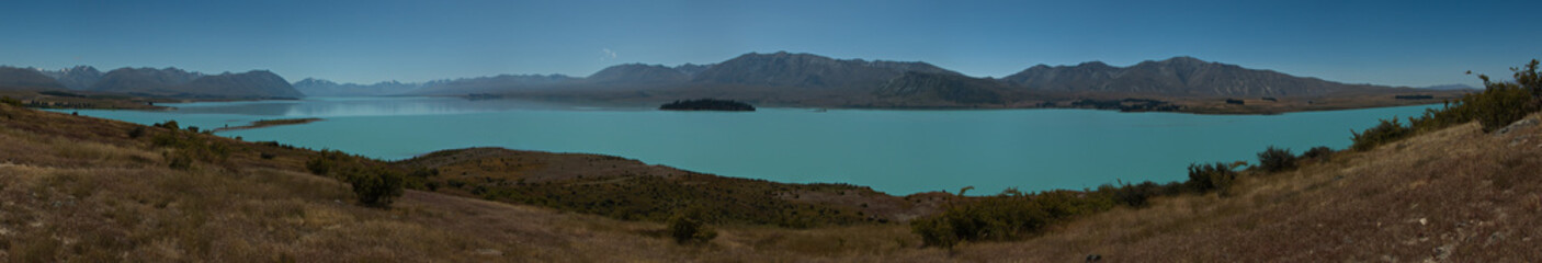 Fototapeta na wymiar Panoramic view of Lake Tekapo from hiking track Peninsula Walkway on South Island of New Zealand