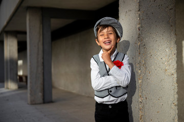 boy with a chulapo cap at fiesta de san isidro, festivities in madrid