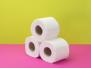 Toilet paper on a bright background.