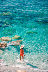 young woman walking at pebble beach Monterosso on vacation Cinque terre Monterosso al Mare pebble...