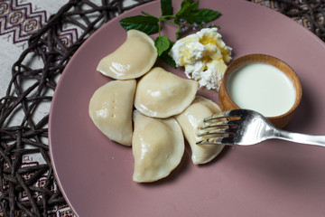 dumplings with cheese, homemade traditional Ukrainian dish varenyky