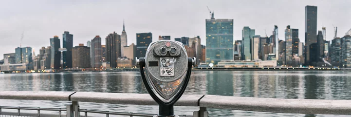 Foto op Plexiglas Panorama of tourist binoculars with Manhattan, New York City skyline in the background © quietbits