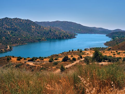PANO LEFKARA, CYPRUS - July 19, 2019: a large reservoir in a mountain gorge near the village of Pano Lefkara. Larnaca District, Cyprus.