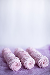 Homemade pink marshmallows on pastel pink background. Creative concept Marshmallow, Meringue. Homemade Sweets dessert