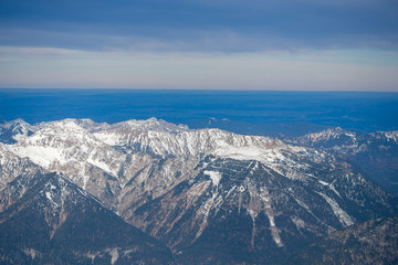 High alpine mountains with snow in Germany and blue beautiful sky