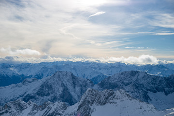 Fototapeta na wymiar High alpine mountains with snow in Germany and blue beautiful sky
