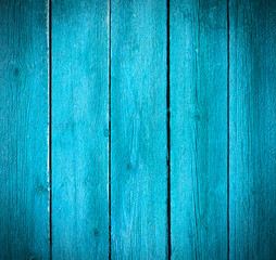 Naklejka premium Old painted wooden board background.