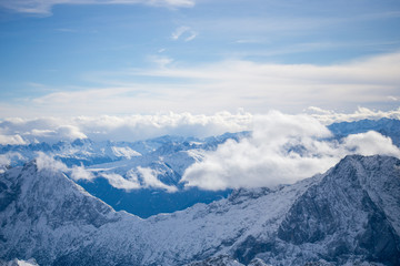High alpine mountains with snow in Germany and blue beautiful sky
