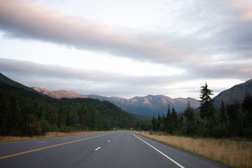 road in the mountains at sunrise