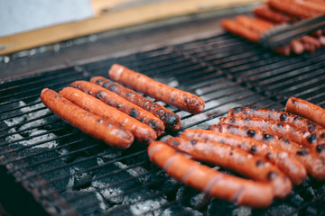 Delicious fresh hot dogs on the grill