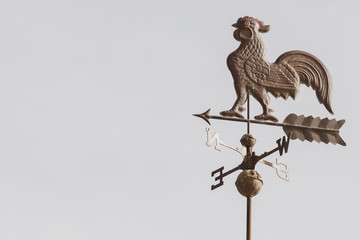 Weather vain with rooster and north, south, east, west directions