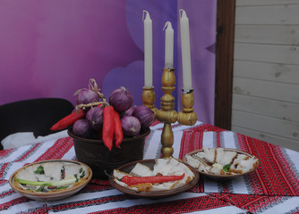 Plate with bacon and pepper on a table in Kiev, February 22, 2020
