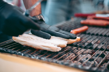 Delicious fresh hot dogs on the grill